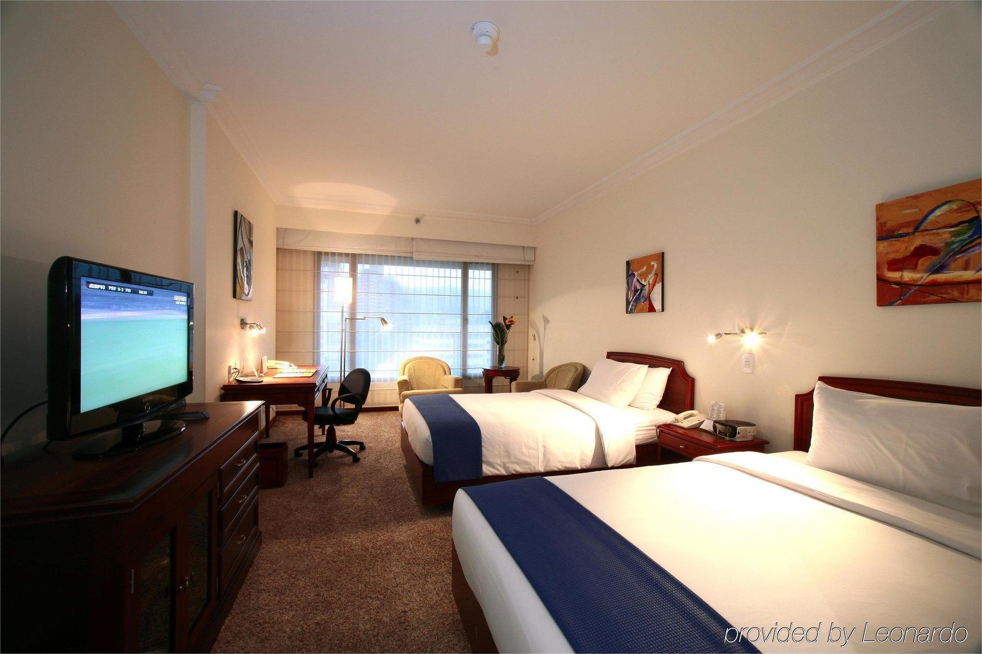 Nh Cali Royal Hotel Room photo